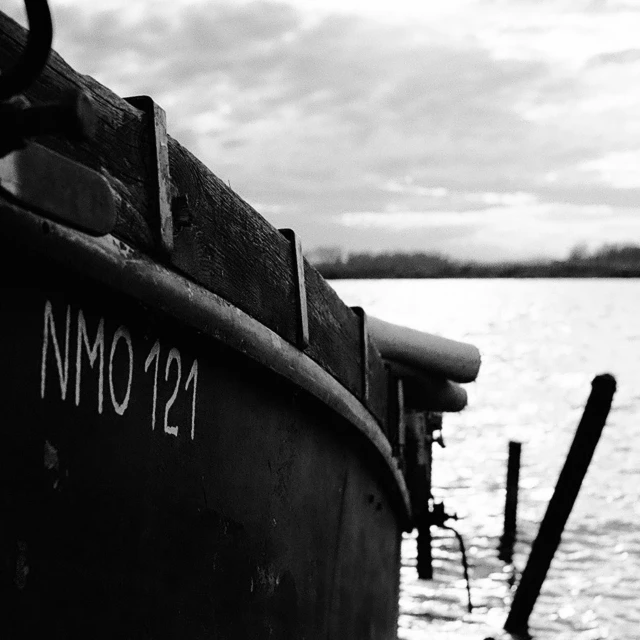 black and white pograph of the bow end of a boat