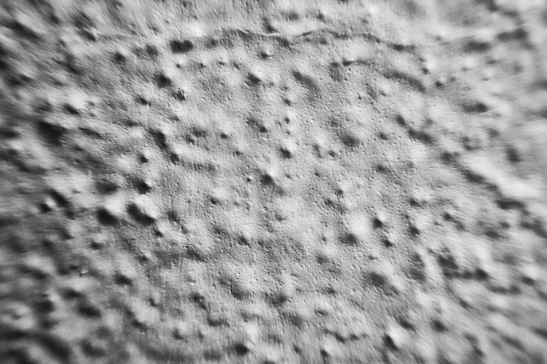 a black and white po of a very rough surface