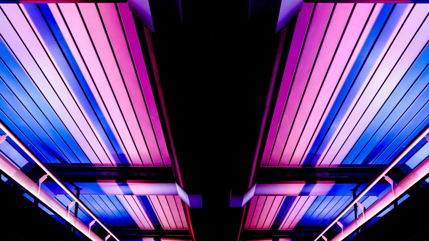 two rows of colored lighting in a building