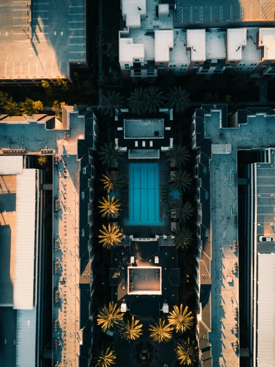 an aerial view of several parking spaces and buildings