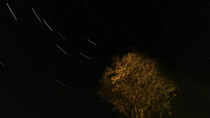 a long exposure picture of some stars in the sky