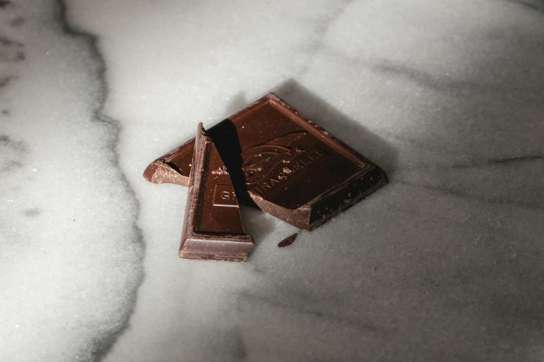 the chocolate is placed on a white surface