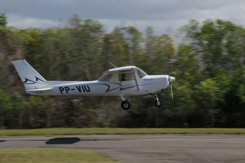 a single engine plane is about to take off from the runway