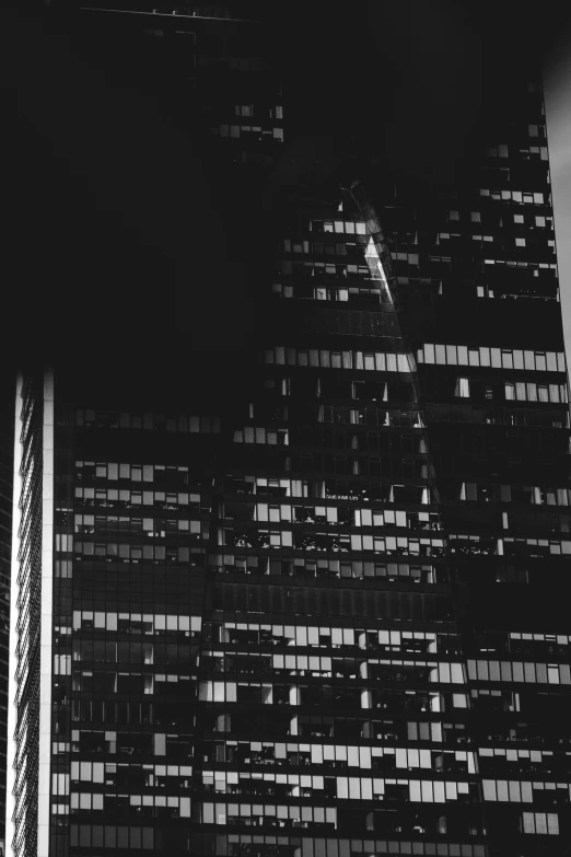 abstract black and white pograph of a building at night