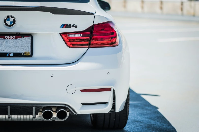 the back view of a bmw car