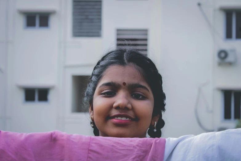 a woman posing with her eyes wide open