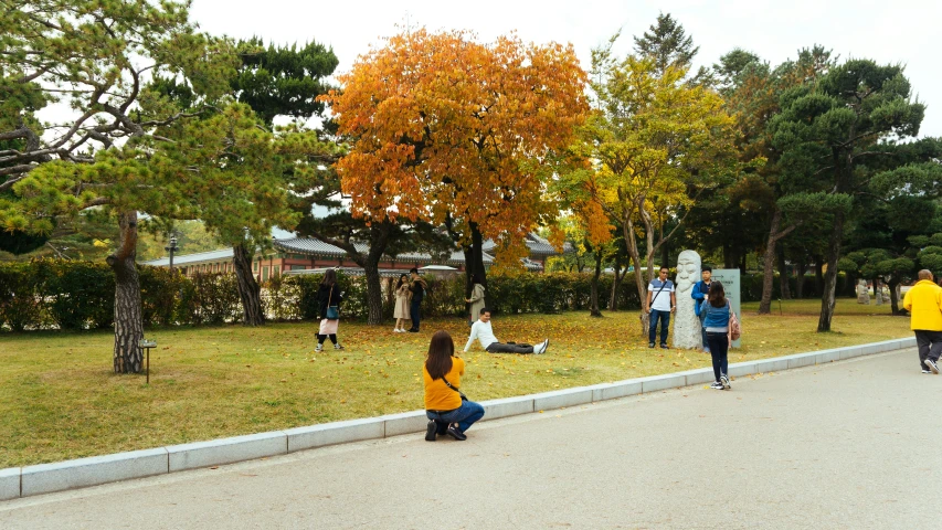 a group of people skateboard and play in the street