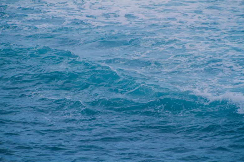 the water waves are blue and white