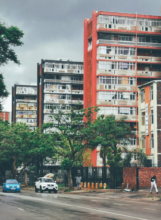 a red and white building on a cloudy day