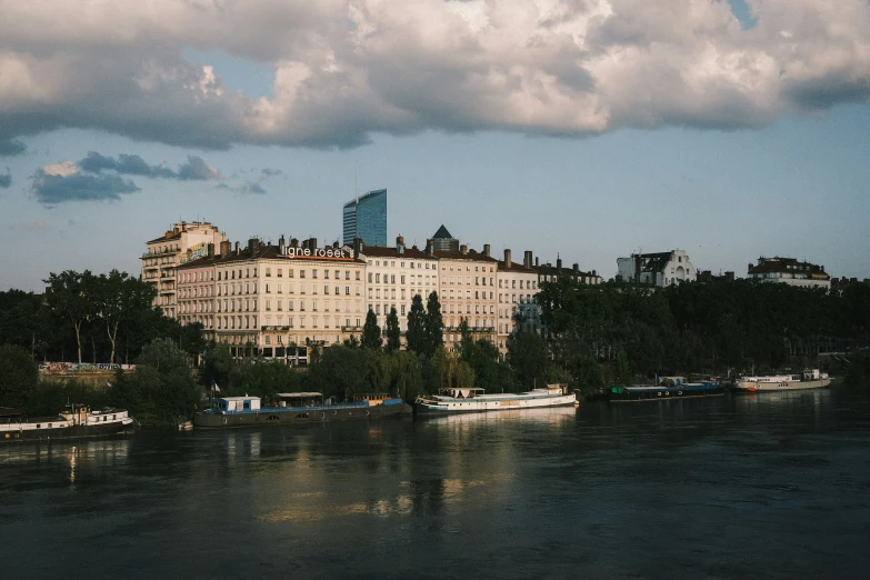 the view of a castle on the side of a river