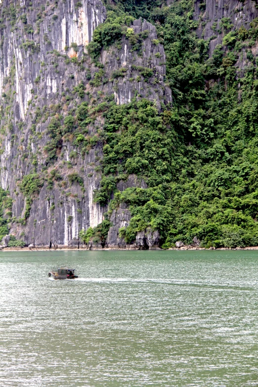 a boat is in the middle of an inlet