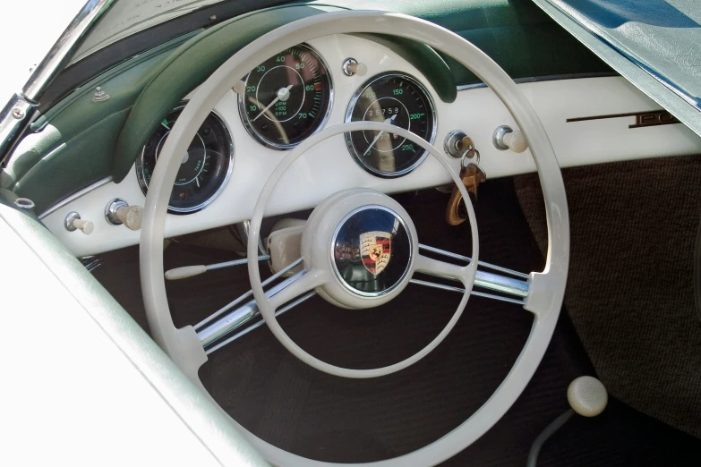 the dashboard and instrument of an old classic car