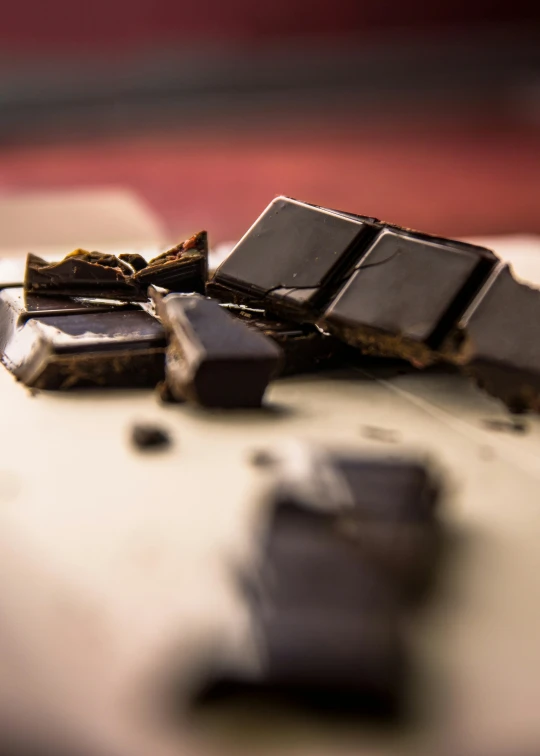 pieces of chocolate and other food on a table