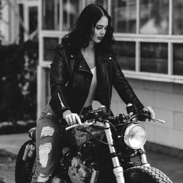 a girl is riding on the back of a motorcycle