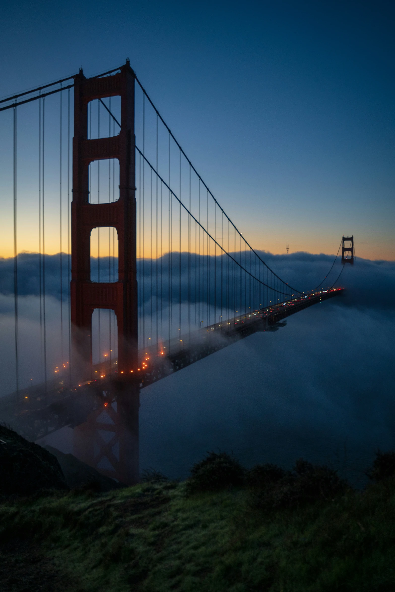 the golden gate bridge in san francisco is shown at night