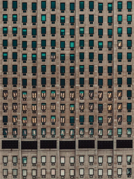 multiple windows and brick building with the tops turned to white