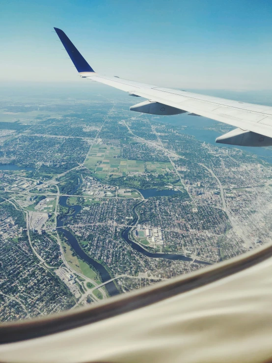 an aerial view of the wing of a plane