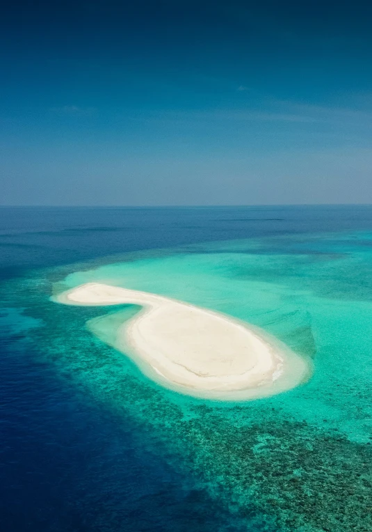 an island in the middle of a small body of water