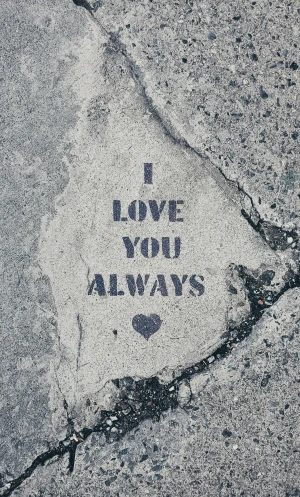 graffiti written in a sidewalk that says love you always
