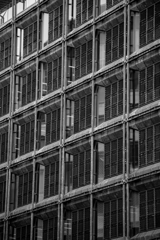 the building is made up of multiple metal balconies