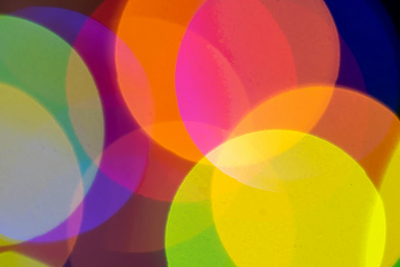 an image of multi colored circles that are looking like lights