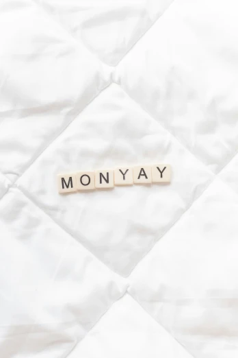 a square word that says monoyay on it