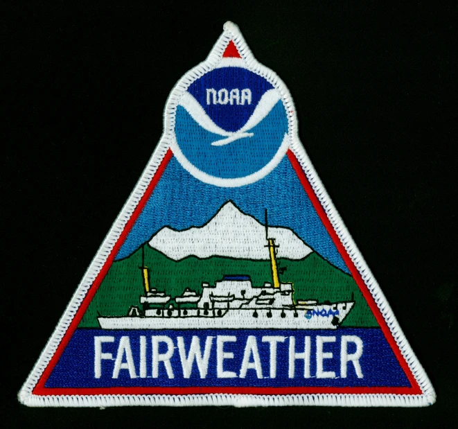 a patch that says, fair weather with an image of a ship in a triangle