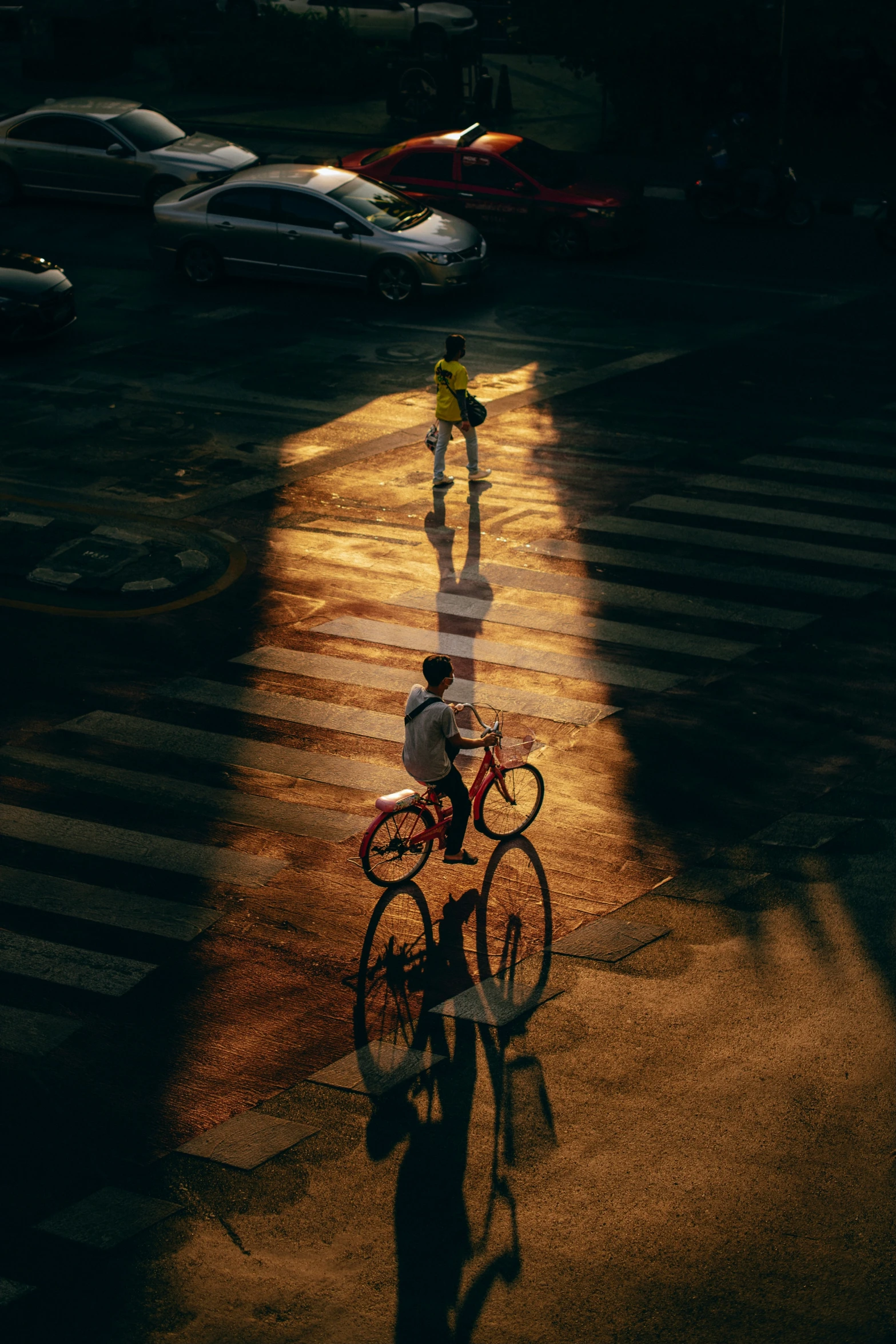 an image of two people on bicycles in the street