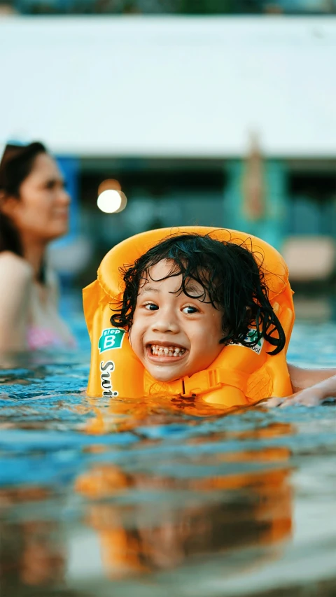 a  in the water laughing at someone