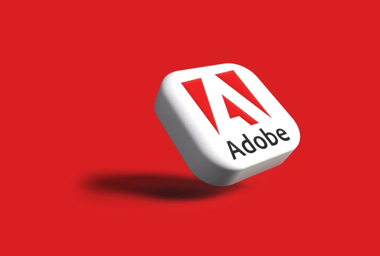 adobe logo on top of a dice