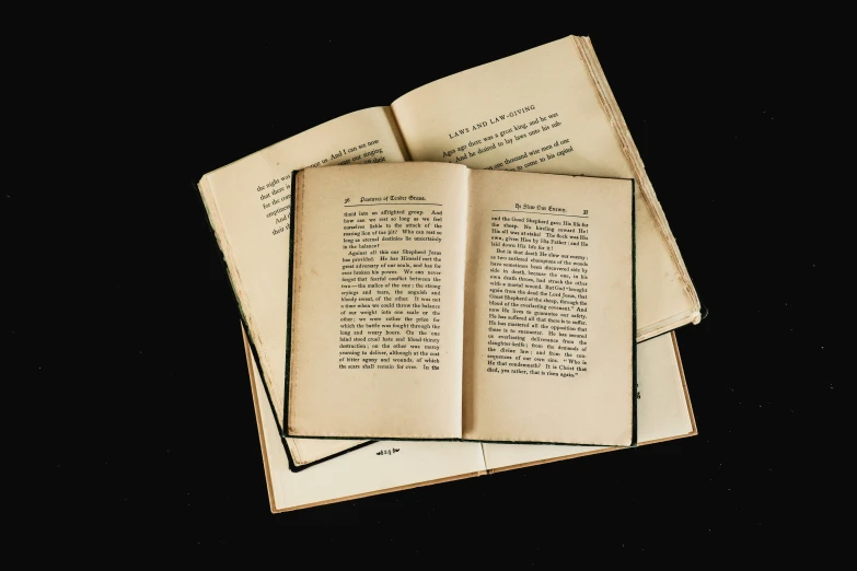 an open book with some pages of text