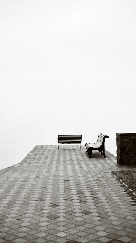 a bench and chair on the roof of a building