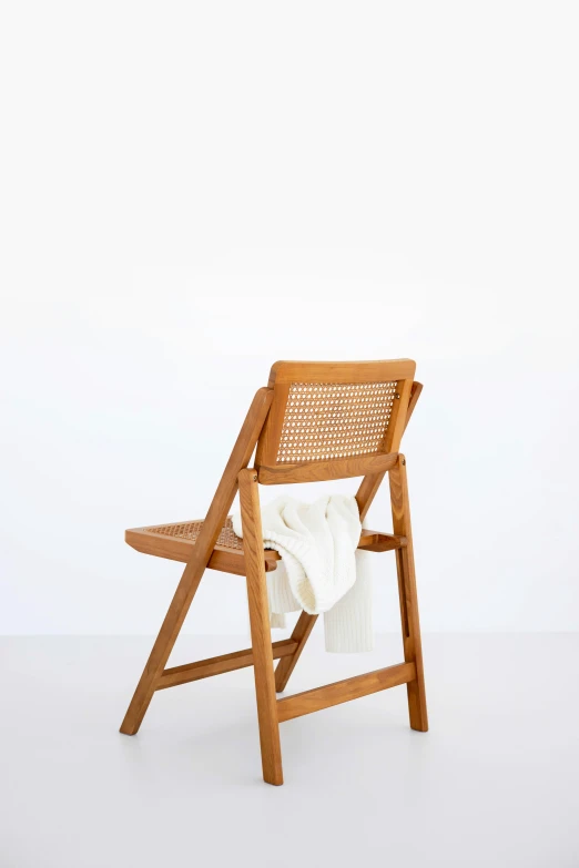 a chair that is sitting on a white background