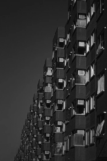 many balconies lined up at the base of an upward building