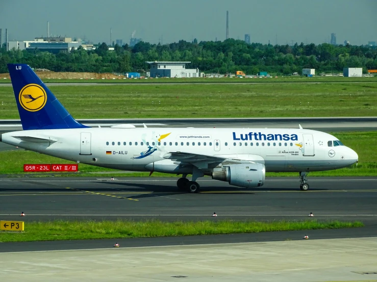 a large commercial airplane on the runway