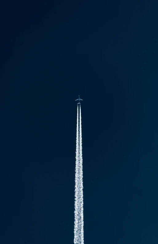 a small passenger plane flying in the sky