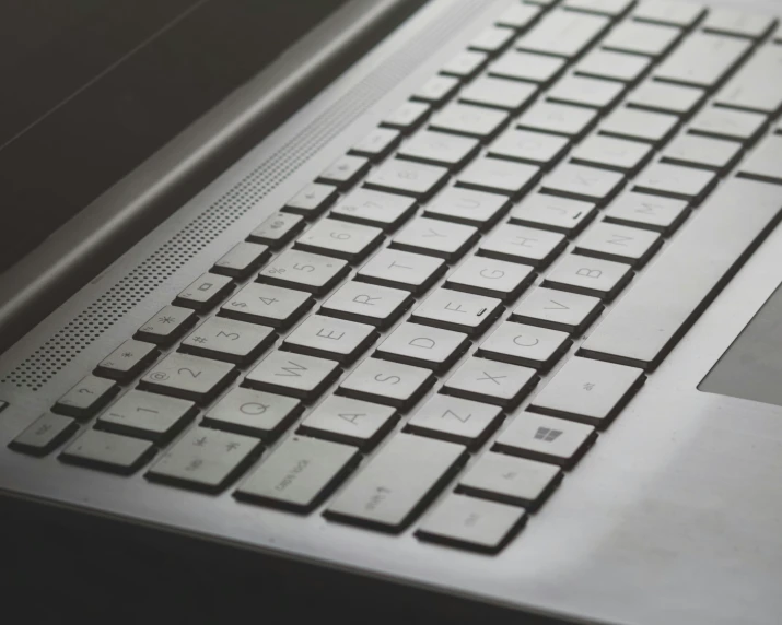 a close - up s of the keyboard of an apple macbook air