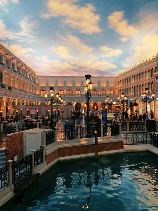 a pond inside the middle of a shopping area