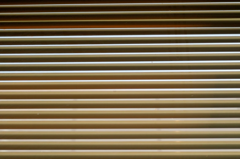 the blinds are closed and have many different colors