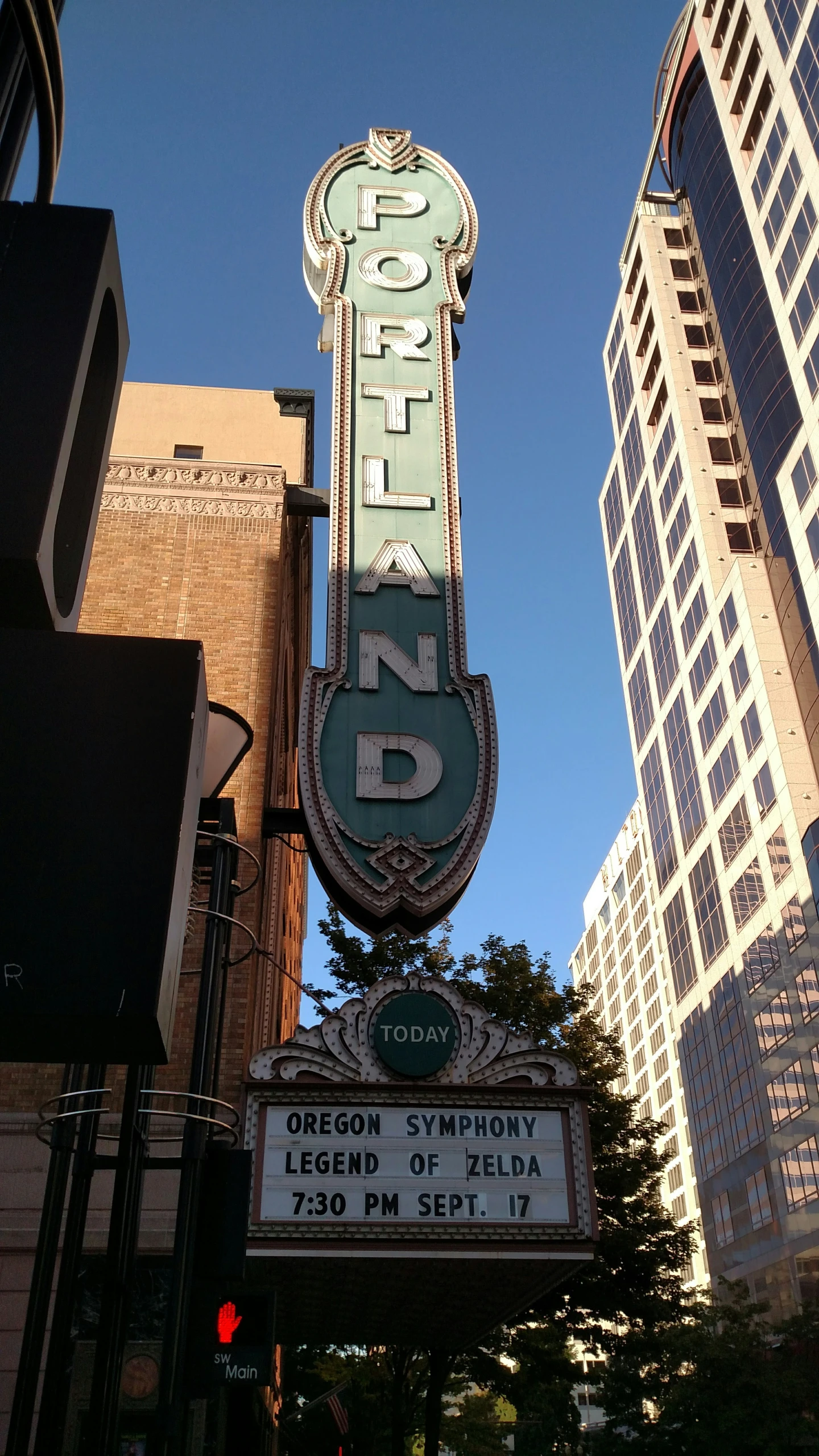 there is a sign in the air above a building