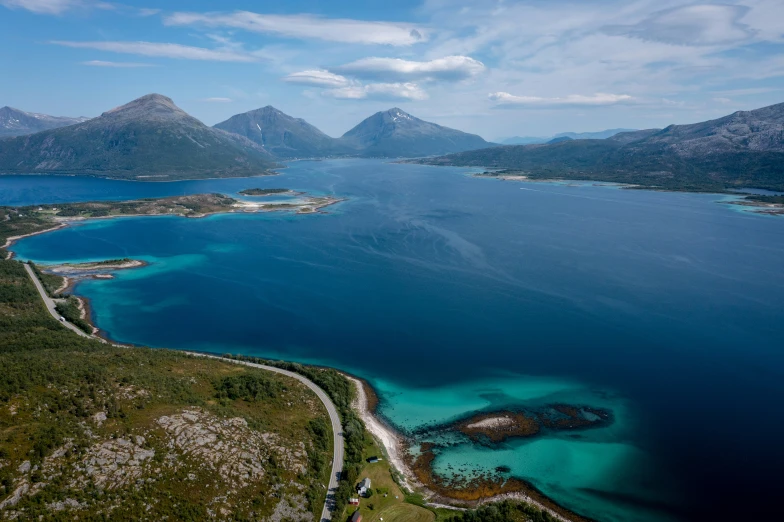 beautiful lake and mountains surround the large island