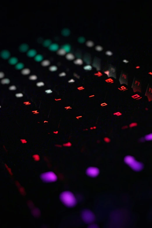 a closeup view of the keyboard in a dark room