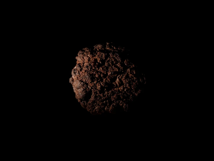 an image of a cookie in the dark