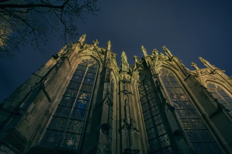 large building that looks like it is lit up at night