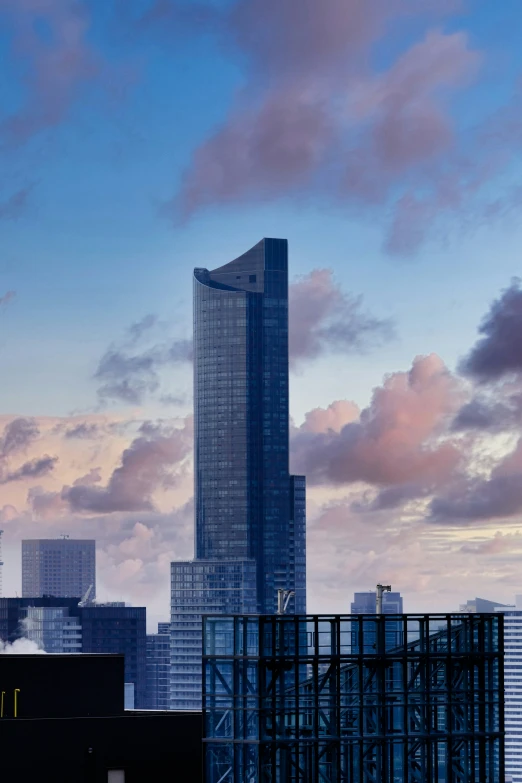 a view of a city, and the top of a building