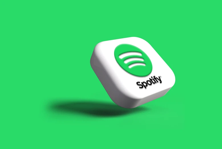 the spotify logo on top of a white dice