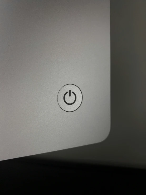 the backside of a laptop with the left side turned on