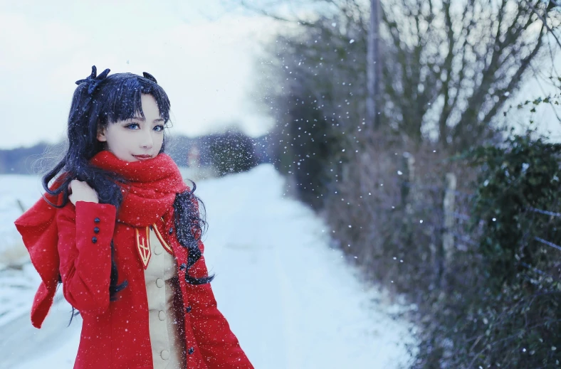 a young asian woman with long black hair in the snow