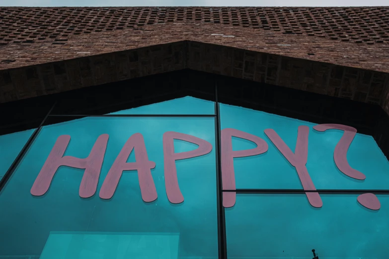 a happy day sign painted on the outside of a window
