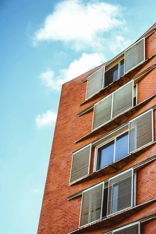 a building with lots of balconies on the side